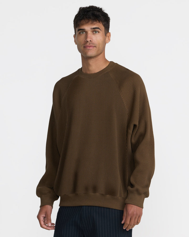 RVCA Men’s Dayshift Supply Co Crew in Bombay Brown, side view on model