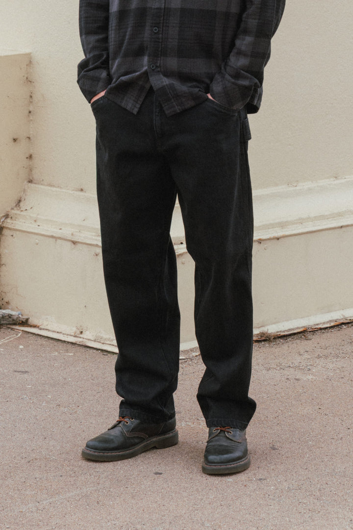 686 Men’s Unwork Hammerhead Denim Pant in Black Overdye - front view on model