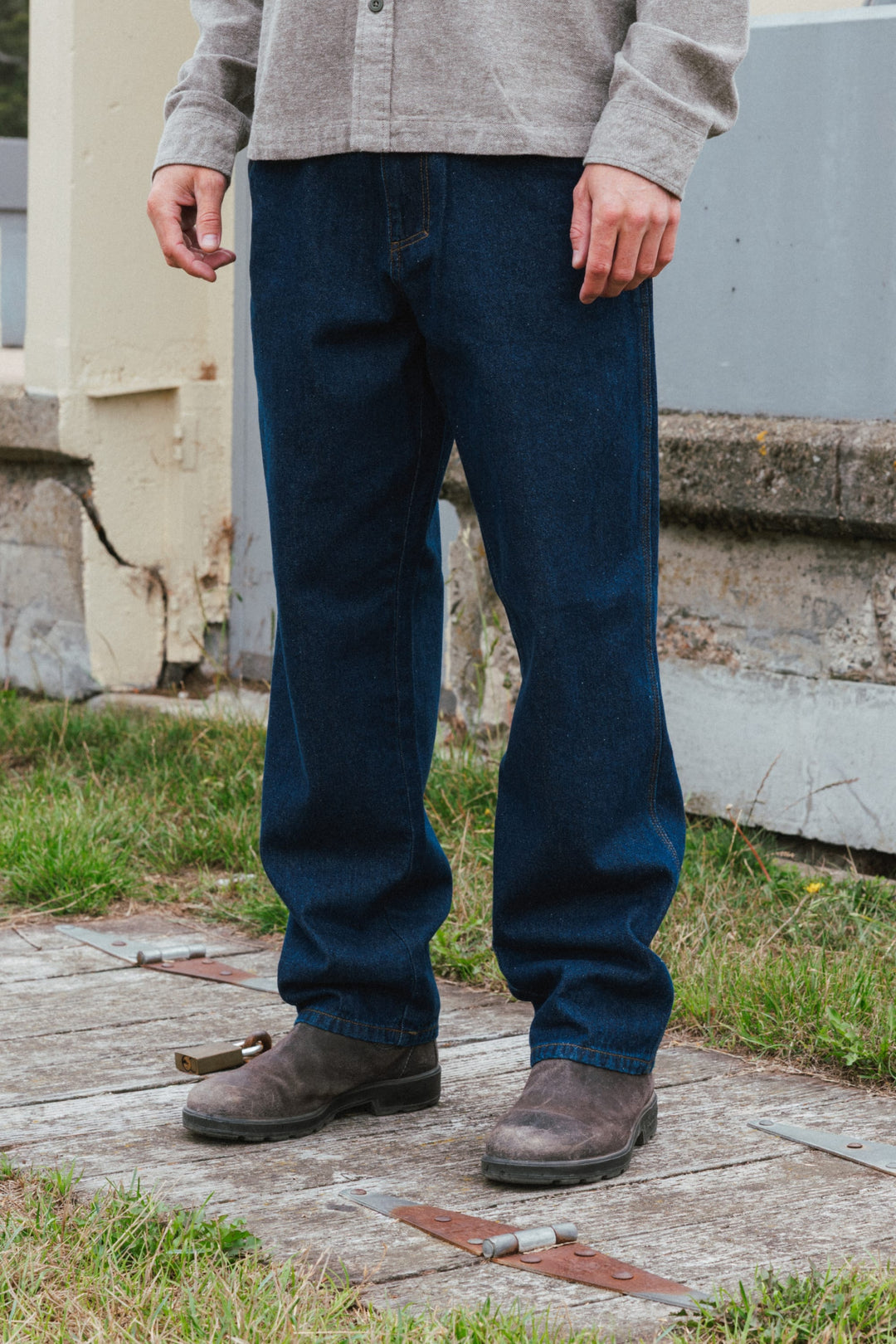 686 Men’s Unwork Hammerhead Denim Pant in Dark Wash - front view on model