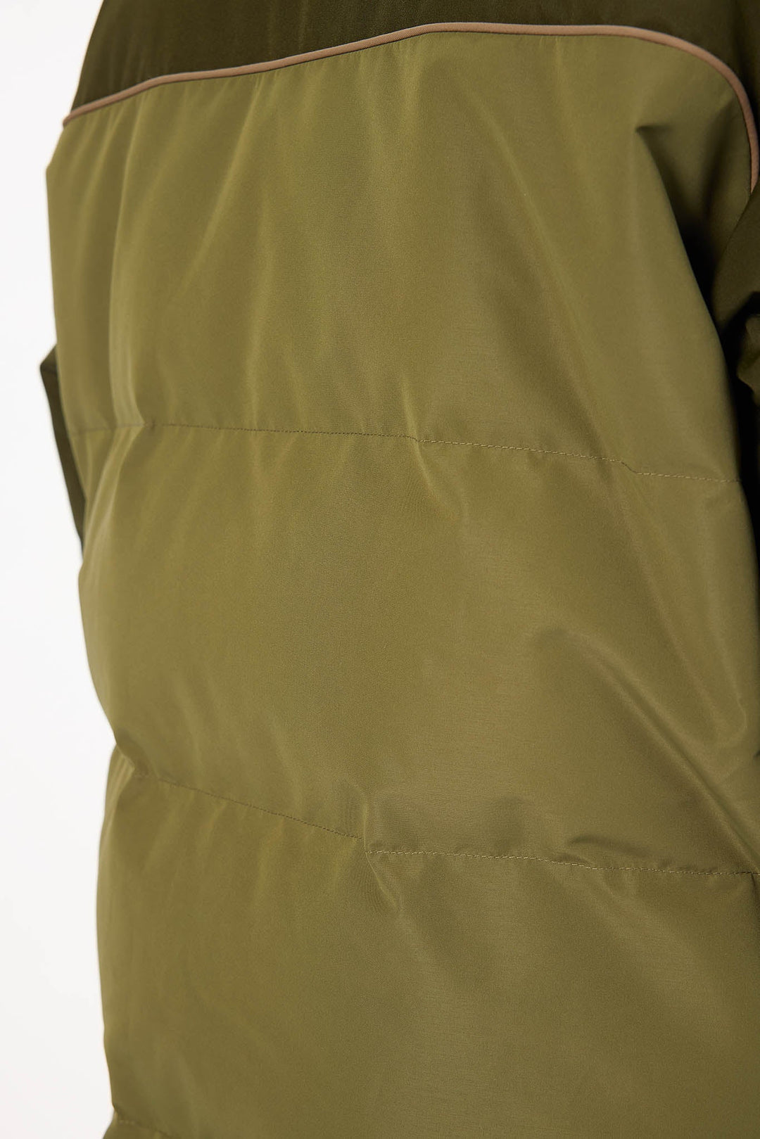 Close-up of a green jacket with a white background