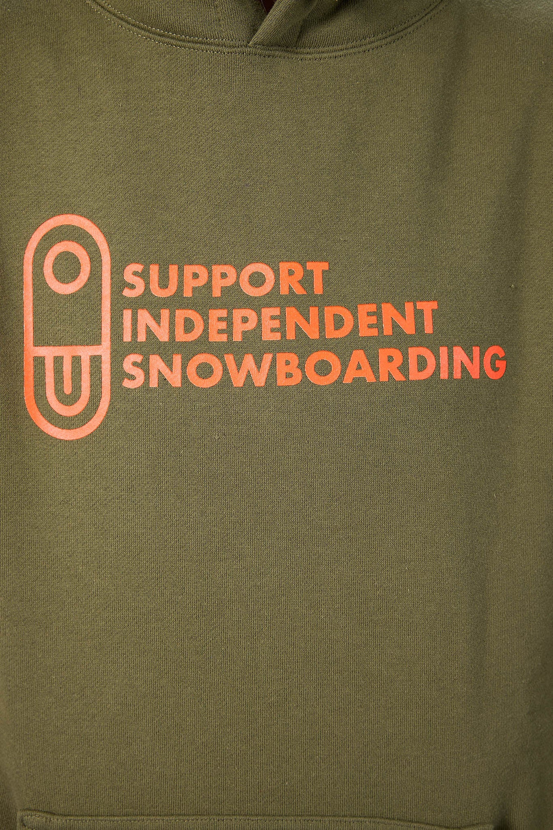 Close-up of an olive green hoodie featuring a bright orange graphic on the chest with the text &