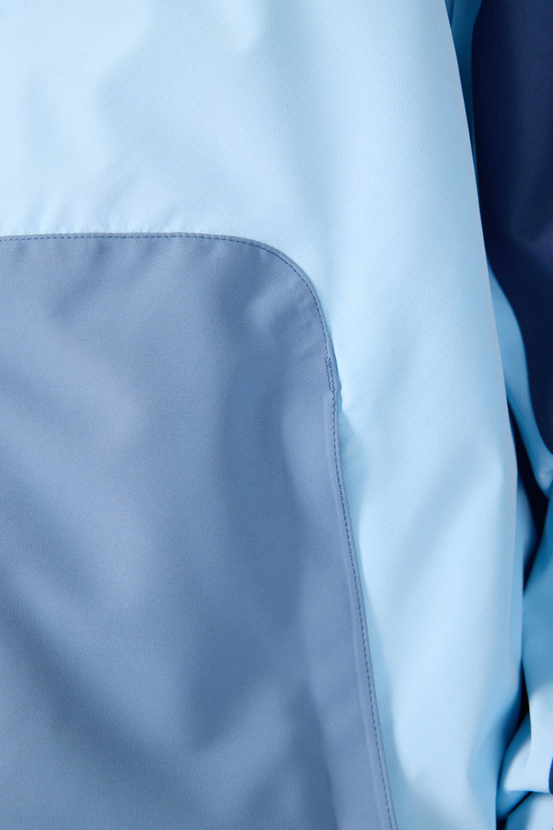 Close-up of light blue fabric with a subtle texture